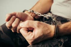 man in handcuffs for mebarol possession